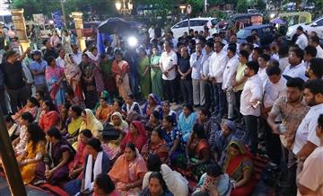 Bisforana:Citizens-and-public-representatives-light-lamps-at-Ram-Temple-wishing-Naveen-Babu-a-speedy-recovery